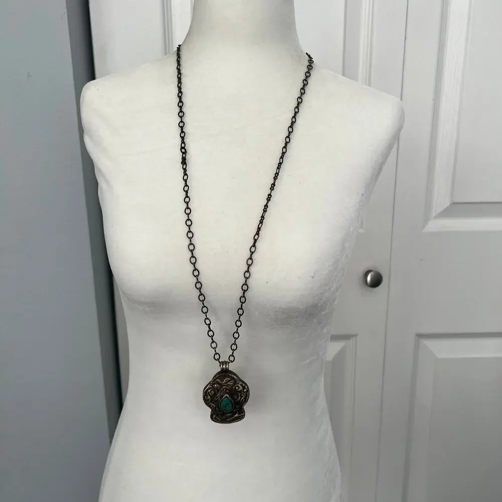 Vintage silver pendant necklace with turquoise stone - intricate animal design